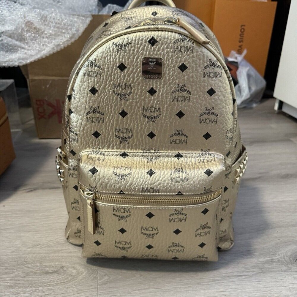 MCM Backpack Gold Medium w/studs NWT! Limited Edition.MMKAAVE32T1001–$1190